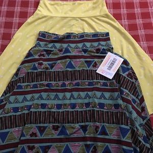 Two Lularoe kids Azure skirts.